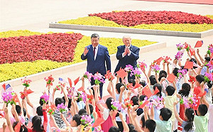 中國安排百名孩童歡迎川普  綠營：想到習近平與普丁聊器官移植「令人毛骨悚然」
