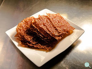 肉乾怎麼做的？為什麼牛肉乾絲絲分明、豬肉乾香軟多汁、肉紙又輕薄脆口？