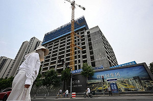 中國服務業景氣度回升 IMF提資金救房市遭中國反對