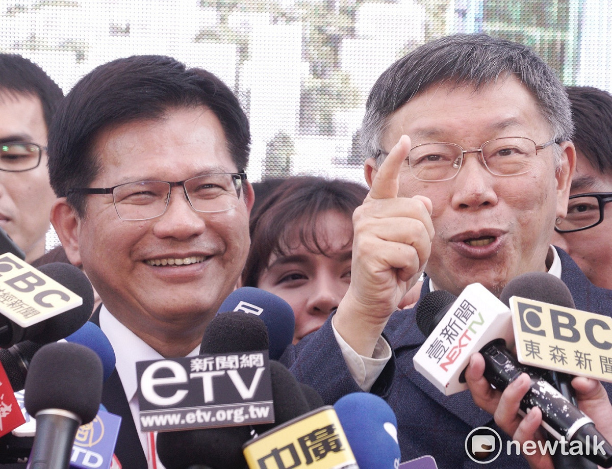 交通部長林佳龍、台北市長柯文哲受訪。 圖：張良一 / 攝