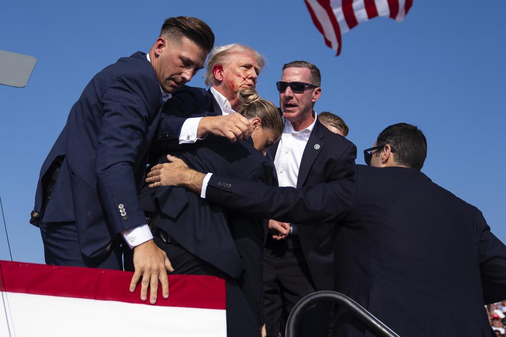 美國前總統川普（Donald Trump）於當地時間7月13日晚間在賓州參加造勢活動時，遭遇槍擊事件。 圖：美聯社／達志影像