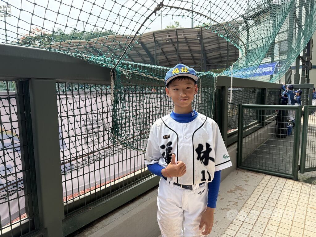 115年謝國城盃少棒賽22日開打，北市福林國小首戰投打發揮，游日誠（圖）敲出長打、貢獻2分打點，助隊首戰擊敗新竹關東國小。游日誠自信腳程全隊最快，能作戰也具不錯的打擊實力。中央社記者謝靜雯攝 115年3月22日