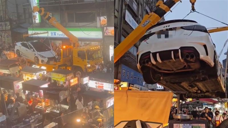 寧夏夜市轎車違停遭拖吊，秒變大型夾娃娃機現場。 圖：翻攝自爆料公社