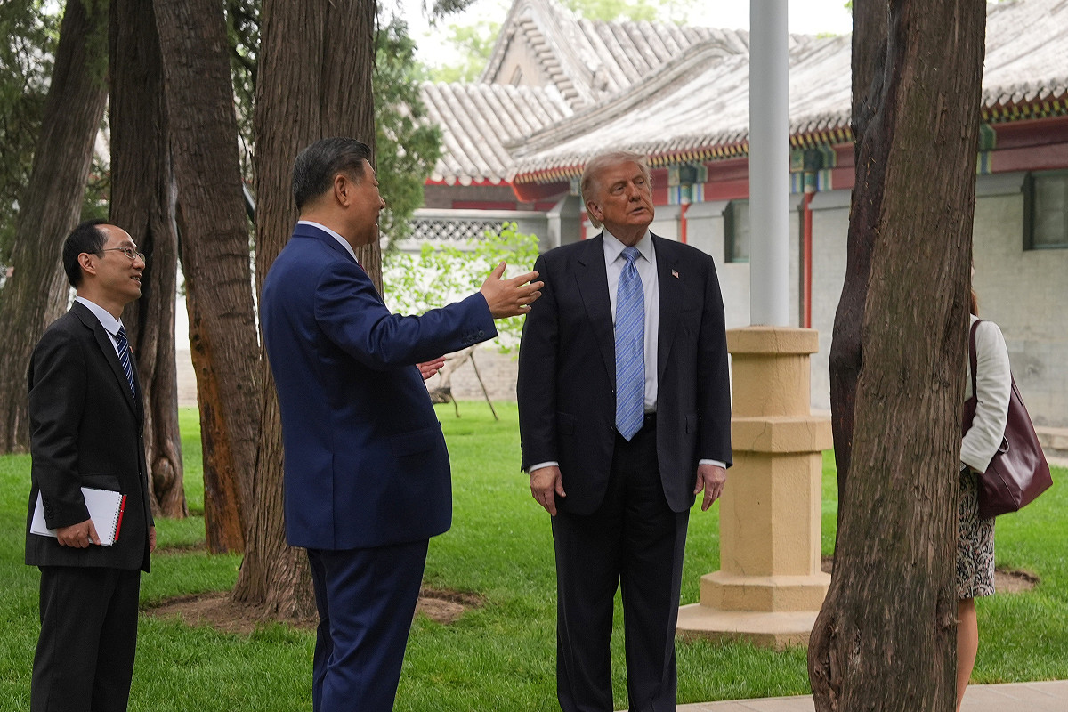 中國國家主席習近平帶著美國總統川普在中南海內參觀。 圖：達志影像/美聯社