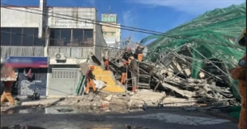 菲律賓北部安赫萊斯市近日發生的在建樓房坍塌事故已導致 17 人死亡、3 人失蹤，目前有 27 人獲救。 圖 : 翻攝自新華網