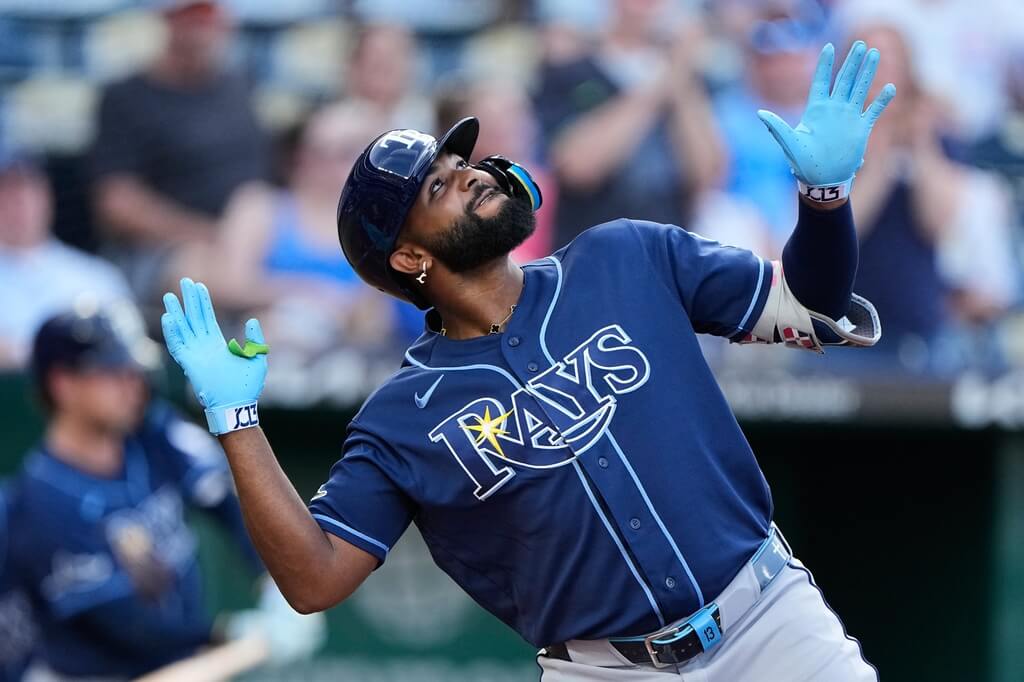 MLB坦帕灣光芒重砲卡米內羅6月30日擊出3分全壘打後開心慶祝。（美聯社）