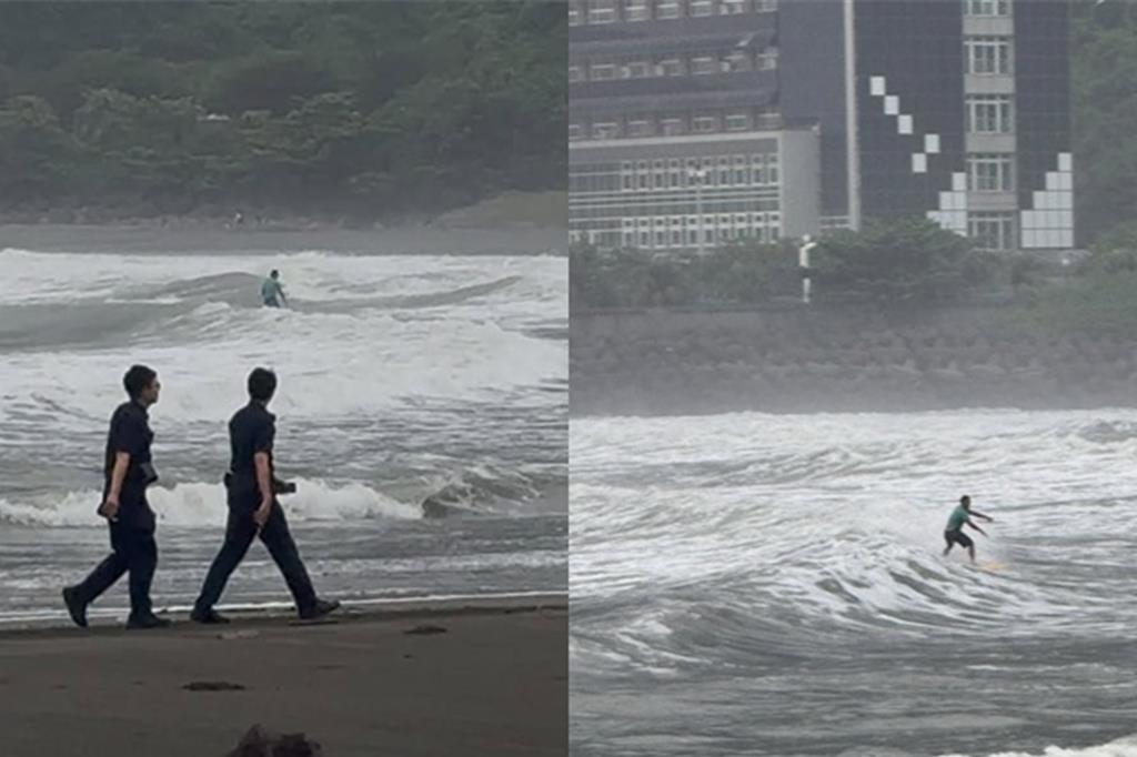 昨日高雄放颱風假，男子衝到高雄西子灣海域衝浪。 圖：翻攝自爆料公社公開版