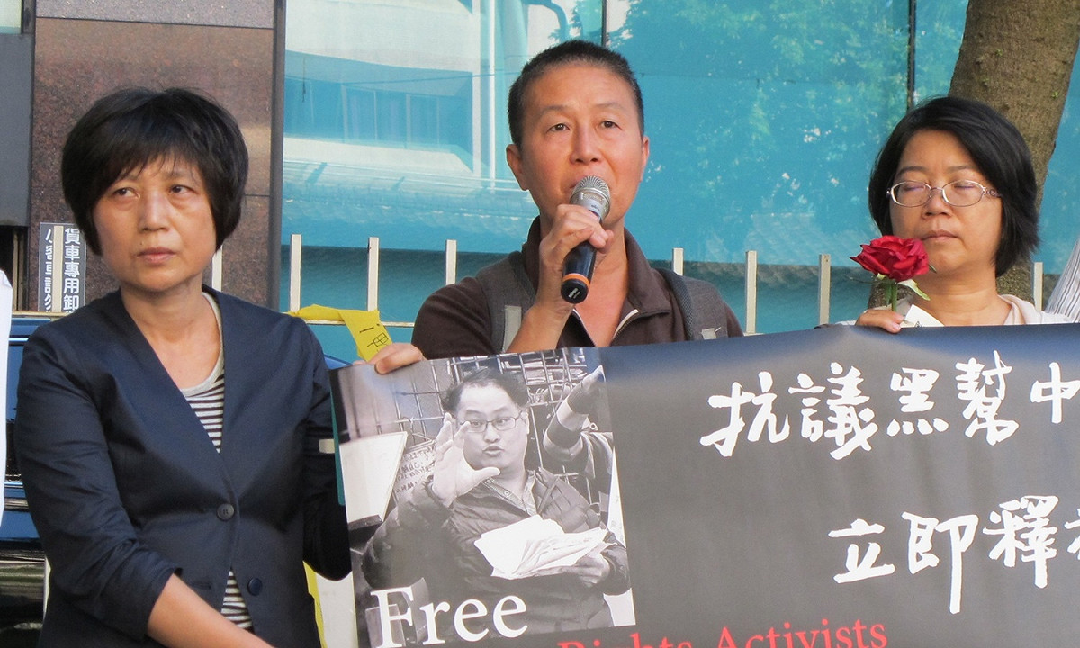 李明哲救援大隊28日在蔡瑞月舞蹈社舉行記者會，圖為台教會會長林秀幸、前立委王麗萍與文山社區大學校長鄭秀娟（由左至右）。 圖：林朝億/攝