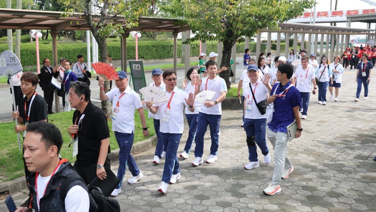 名古屋亞運歡迎儀式中斷，運動部長李洋一度因不明原因遭拒進場。 圖：擷自中華奧會