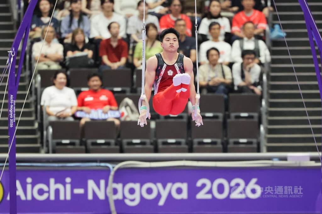 2026愛知名古屋亞運競技體操男子團體項目23日進行決賽，台灣好手莊佳龍（圖）在吊環項目出賽，穩定發揮。中央社記者翁睿坤名古屋攝　115年9月23日