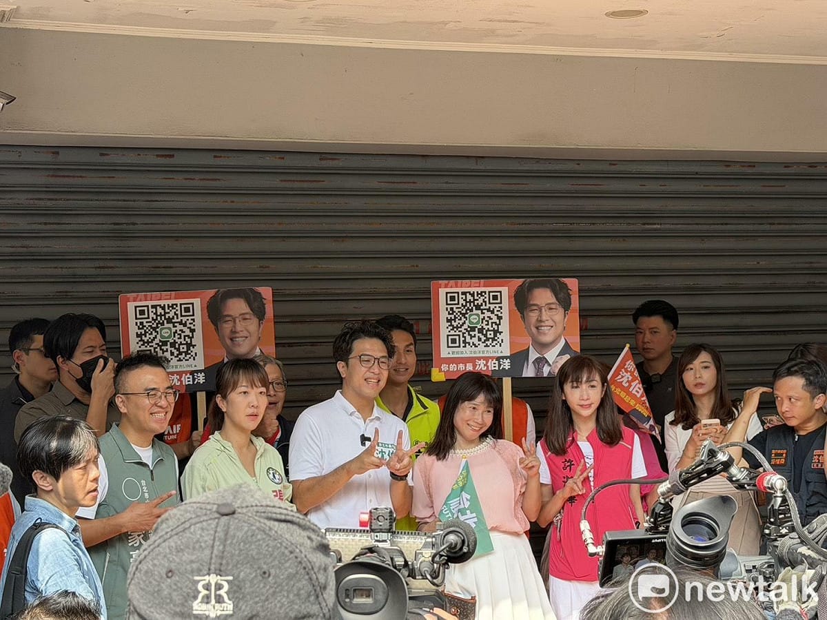 沈伯洋赴永春市場掃街，包括台北市議員洪健益、許淑華、張文潔、議員參選人郭凡陪同。 圖：高逸帆／攝