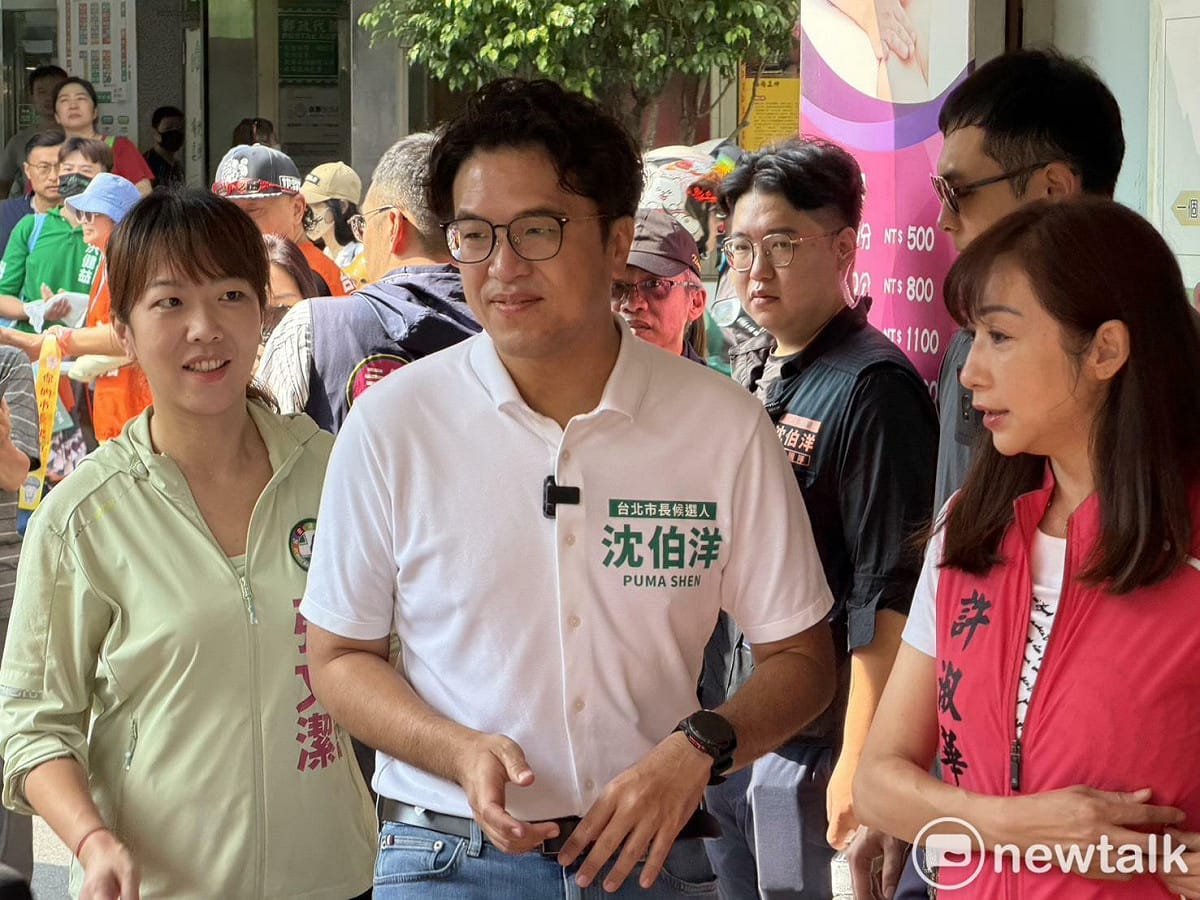 沈伯洋赴永春市場掃街，包括台北市議員洪健益、許淑華、張文潔、議員參選人郭凡陪同。 圖：高逸帆／攝