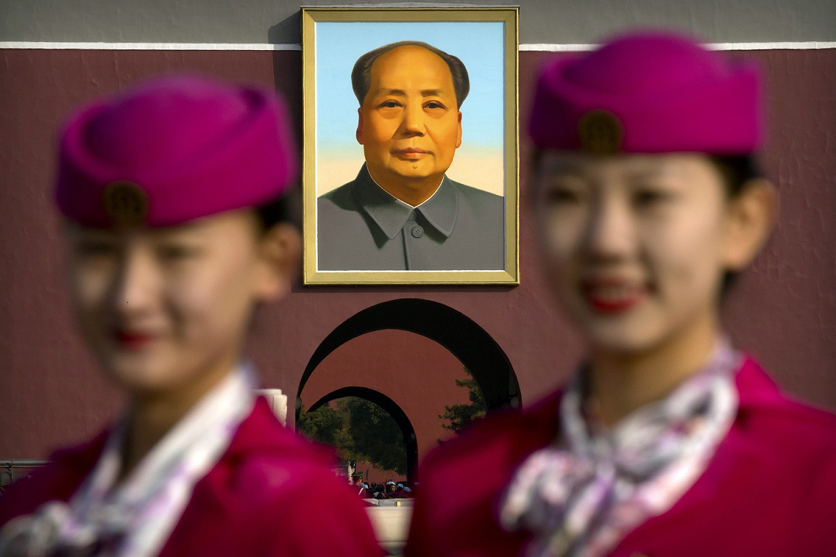 今天是毛澤東冥誕，大陸各地都有大批民眾舉辦紀念活動。 圖 : 達志影像/美聯社