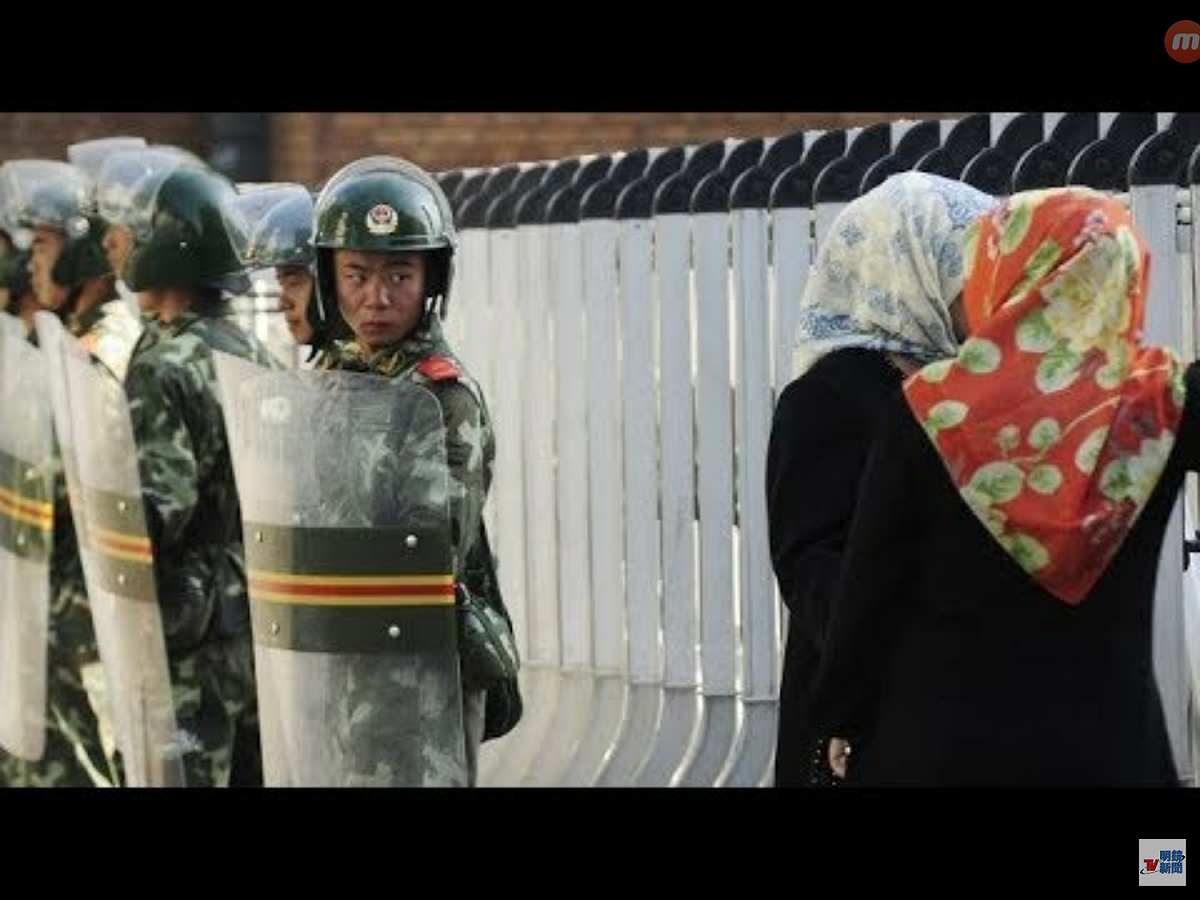 新疆喀什郊外的一個「再教育營」，中國武警嚴密監控維族人的活動。 圖：翻攝自Youtube（資料畫面）