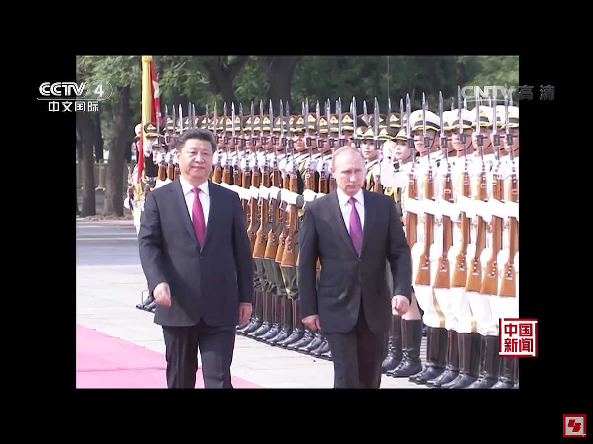 俄方將按國事訪問的重視程度安排兩國元首的雙邊活動，俄視習近平為蒲亭（右）「最尊貴、最優先的客人」，將以高規格禮遇接待。 圖：翻攝自央視新聞畫面