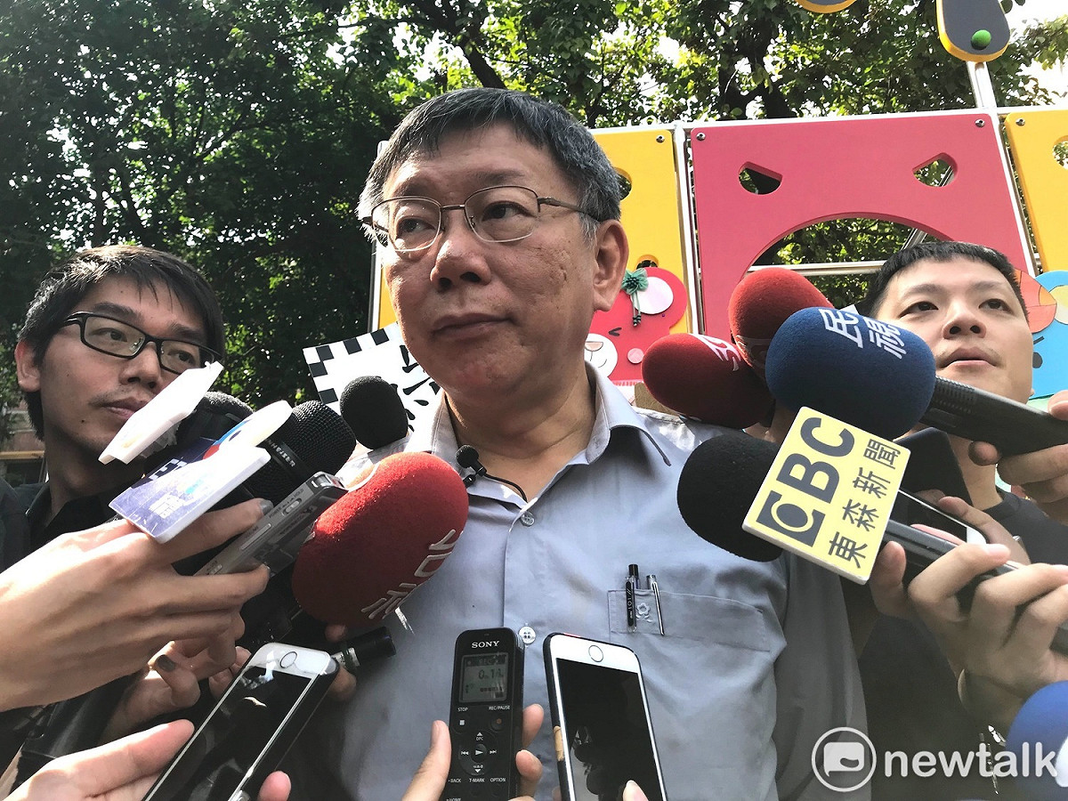 台北市長柯文哲今（26）日出席活動遭無黨籍議員候選人蔡宜珊嗆聲「沙豬閉嘴」。 圖：新頭殼資料照片