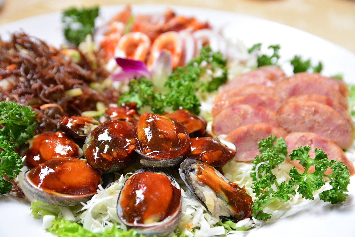 鮑魚經常是年節常備食材，輕鬆料理就能美味上桌。 圖：新北市農業局漁管處提供