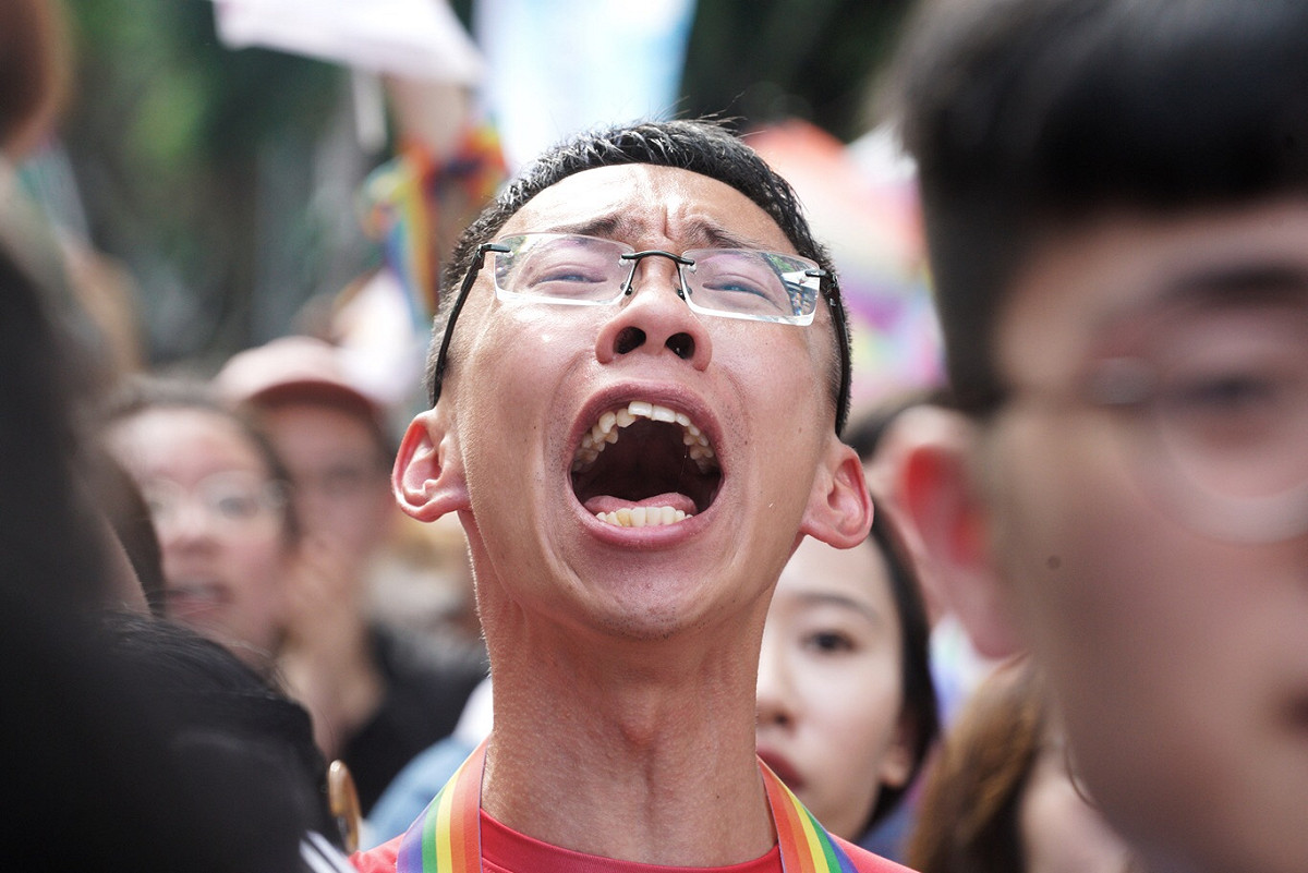 立法院院會三讀通過同婚專法，支持者激動吶喊。 圖：張良一 / 攝