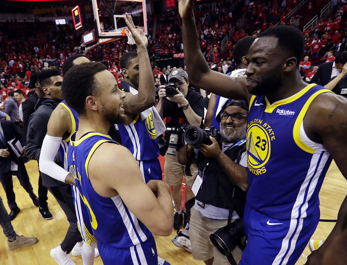 Draymond Green和Stephen Curry同場完成大三元。 圖／美聯社／達志影像