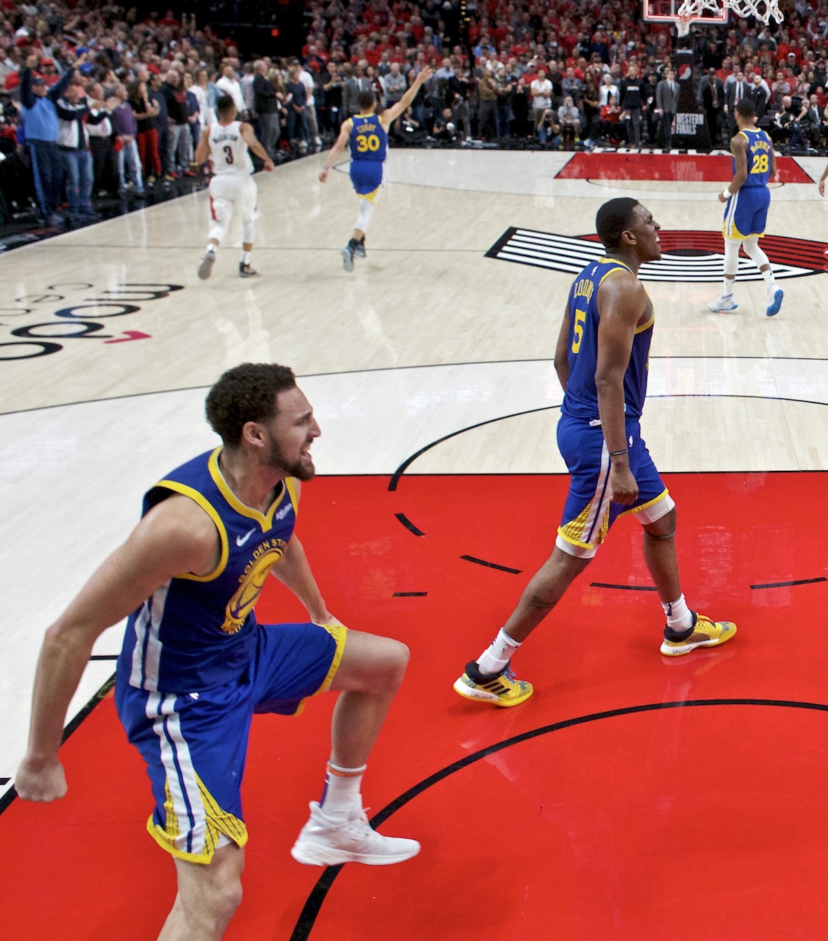 Klay Thompson（左）和Kevon Looney（右）。 圖／美聯社／達志影像