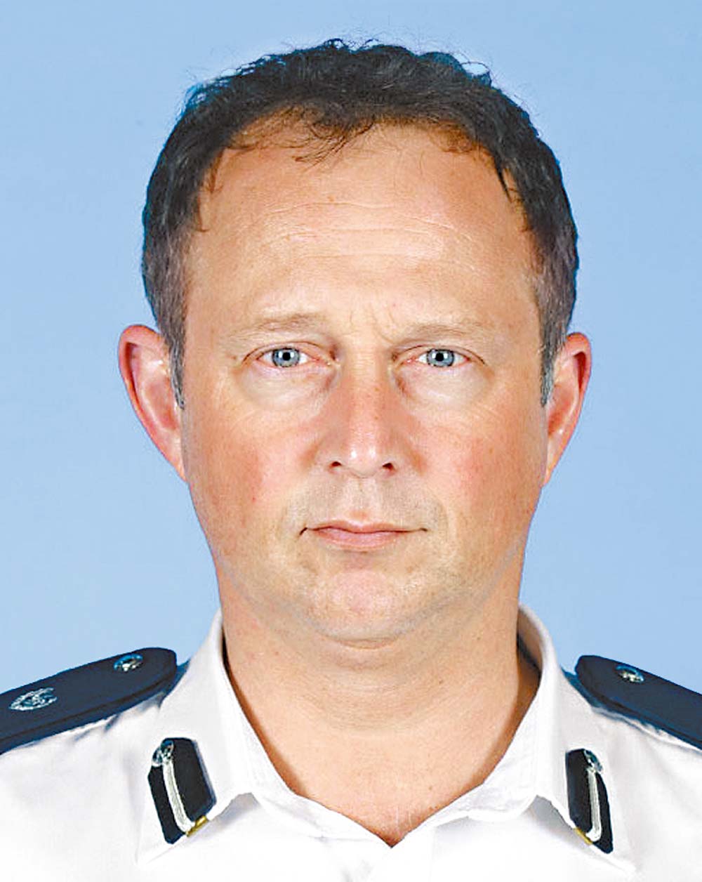 香港英籍警司陶輝被指在612香港反送中遊行中，下令施放催淚彈及橡膠子彈。 圖：翻攝自香港警察官網