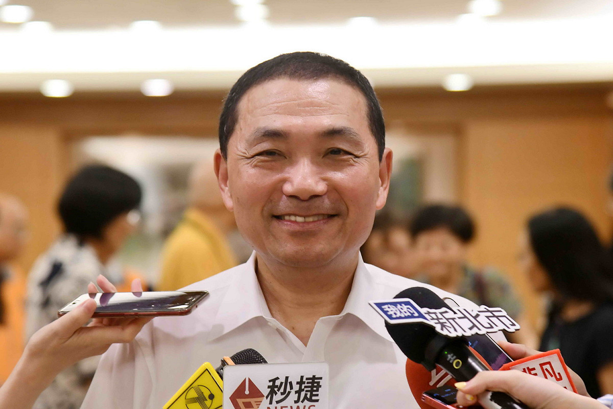 侯友宜被詢問是否擔任韓國瑜競總主委、出席國民黨全代表，都表示「市政第一」。 圖：王峻昌/攝