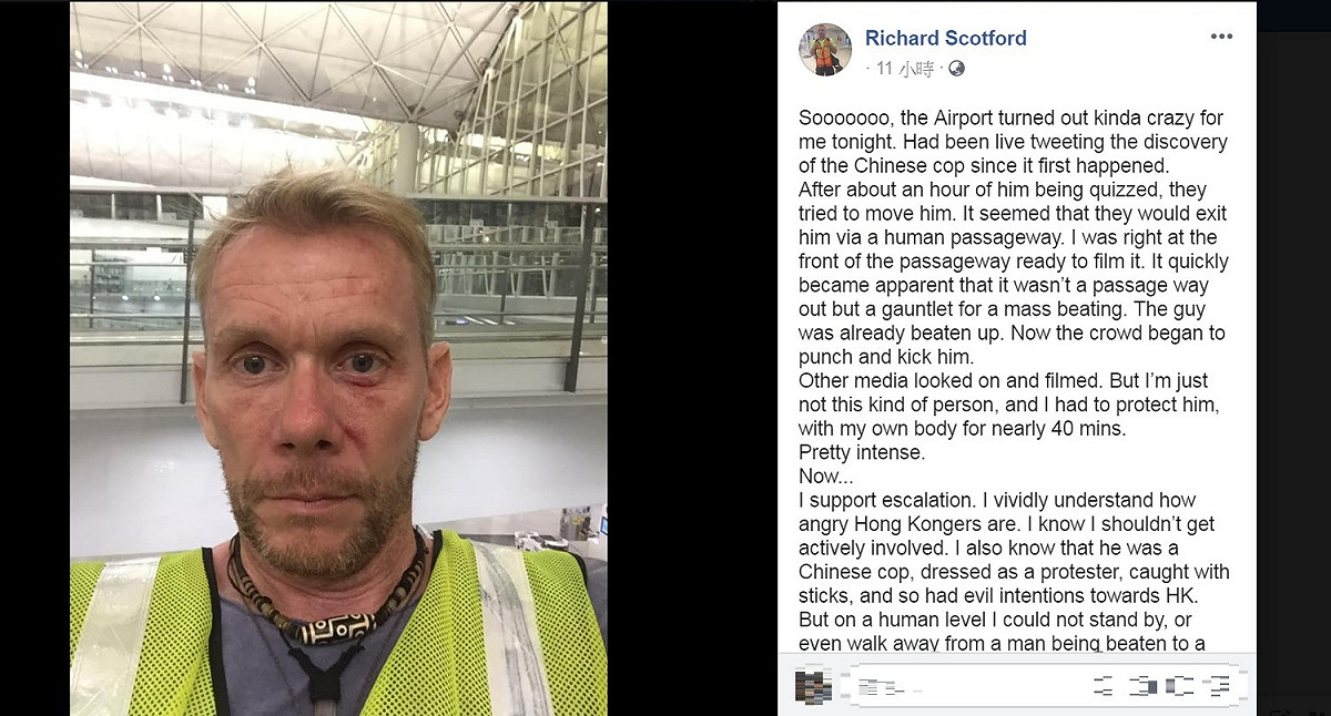 英國記者Richard Scotford臉書發文，表示自己保護假扮公安的示威者長達40分鐘。呼籲「我們該對抗的是體制，而不是個人」。 圖：翻攝Richard Scotford臉書