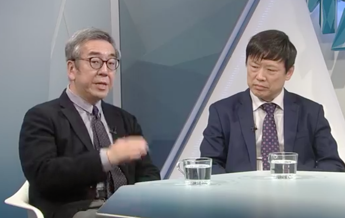 香港作家陶傑（左）與《環球時報》總編輯胡錫進（右）。 圖：翻攝自《香港電視台視點31》臉書粉專