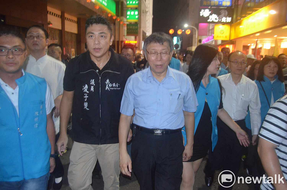 凌子楚日前陪柯文哲掃街，被某臉書粉絲專頁影射準備「收前金」參選，他已報案。 圖：蔡坤龍/攝