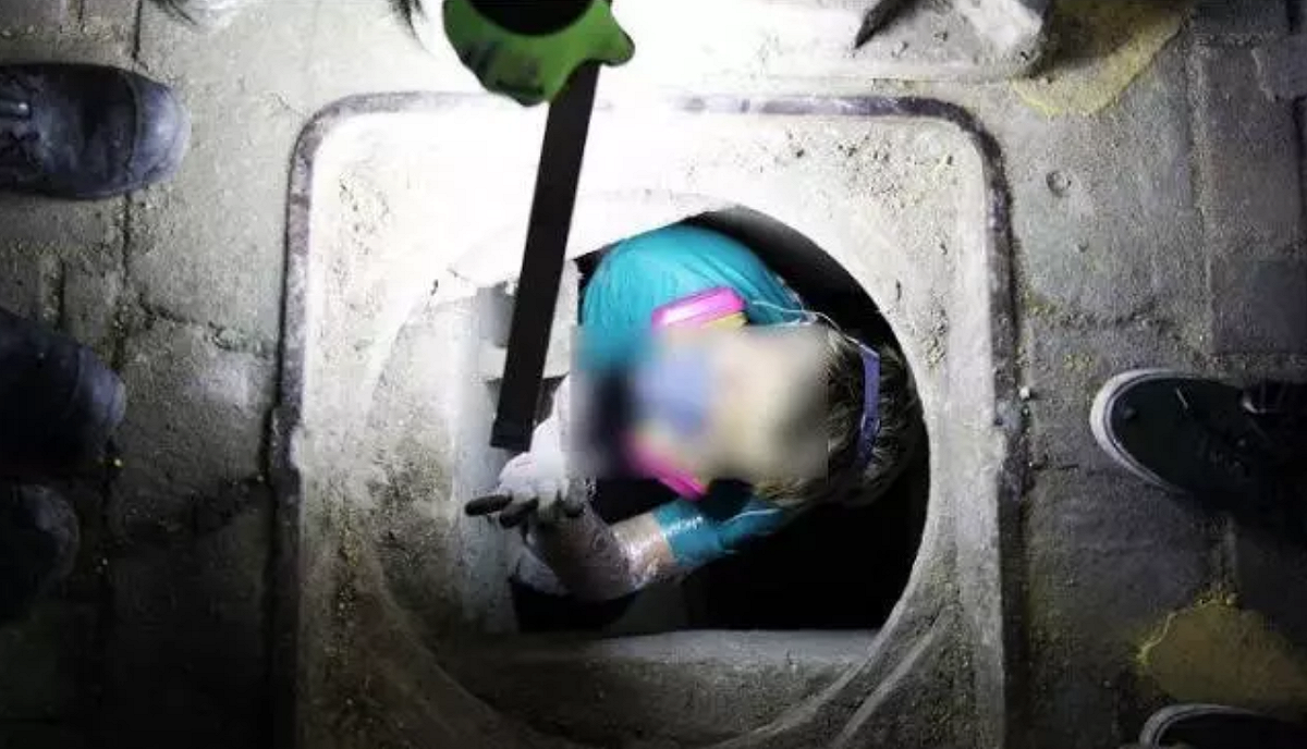 示威者從下水道逃出理大的畫面被媒體報導，引來港警更嚴密的圍捕。 圖：翻攝自環球網