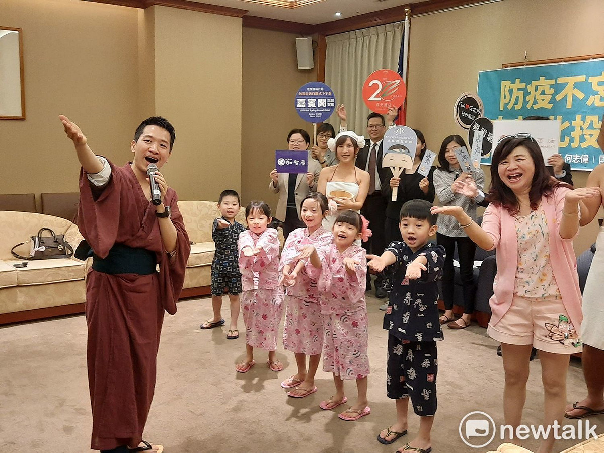 記者會找來小朋友唱跳，呼籲大家來北投泡溫泉。 圖:陳佩君/攝