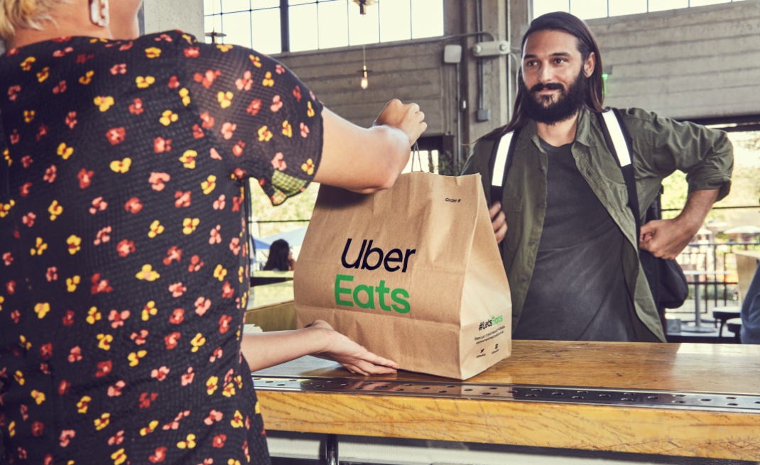 Uber以26.5億美金收購外送平台Postmates。 圖：取自Uber官網
