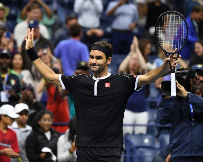Roger Federer美網換上全新黑色戰袍。 圖：美聯社／達志影像