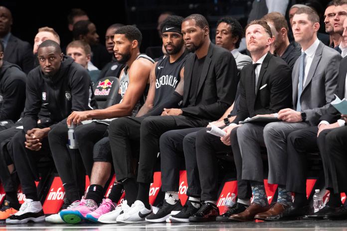 籃網2大球星Kevin Durant、Kyrie Irving因傷無法參與復賽。 圖／美聯社／達志影像