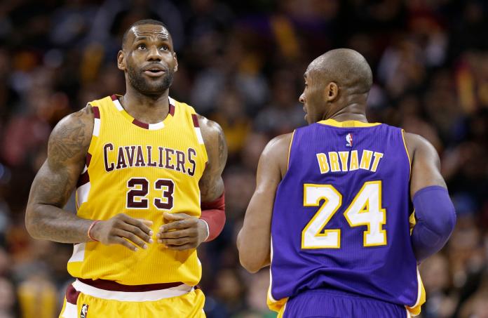LeBron James和Kobe Bryant在場上對決。 圖／美聯社／達志影像