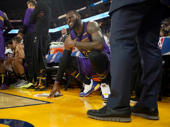 LeBron James左腹股溝拉傷。 圖／美聯社／達志影像