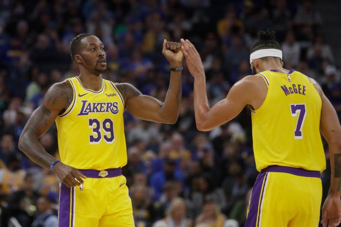 湖人中鋒Dwight Howard（左）, JaVale McGee（右）。 圖／美聯社／達志影像
