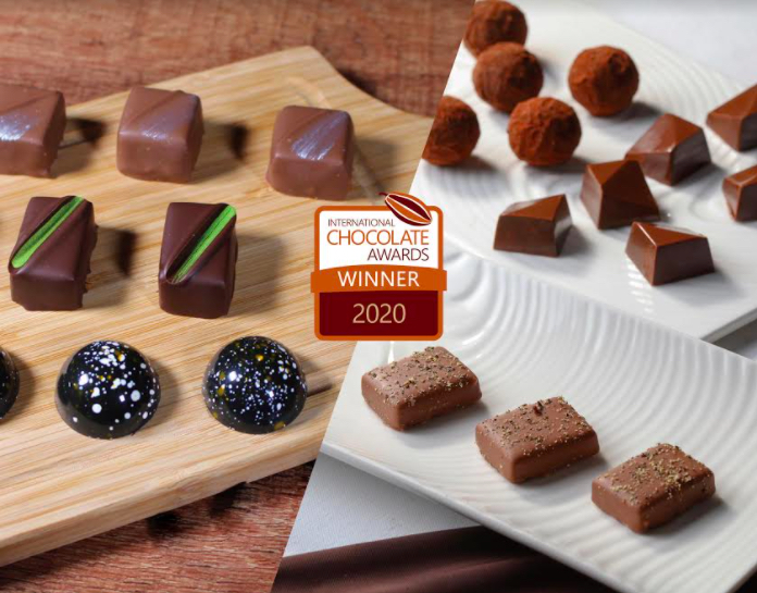 世界巧克力大賽（International Chocolate Awards, ICA）金牌獎的長榮桂冠酒店及長榮空廚綜合精裝巧克力禮盒。 圖：長榮集團／提供
