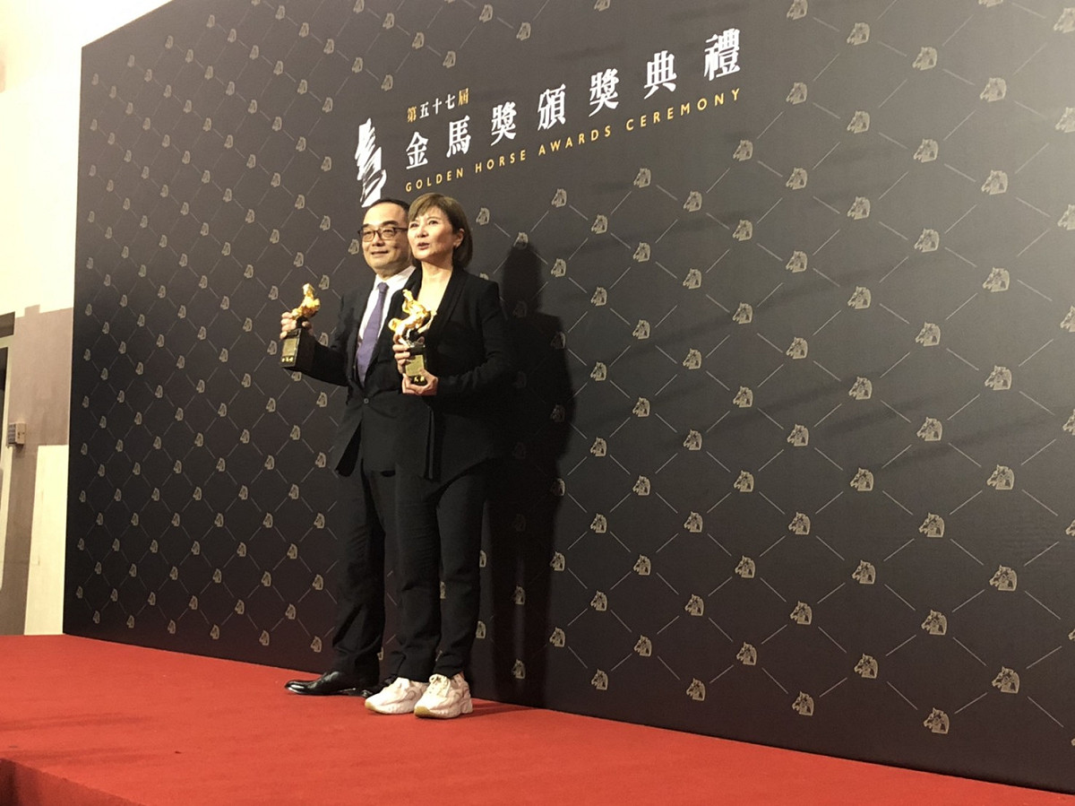 《廢棄之城》導演易智言和監製李烈獲最佳動畫長片，他們感慨表示花了10年心血總算有所交代。 圖：汪靖軒／攝