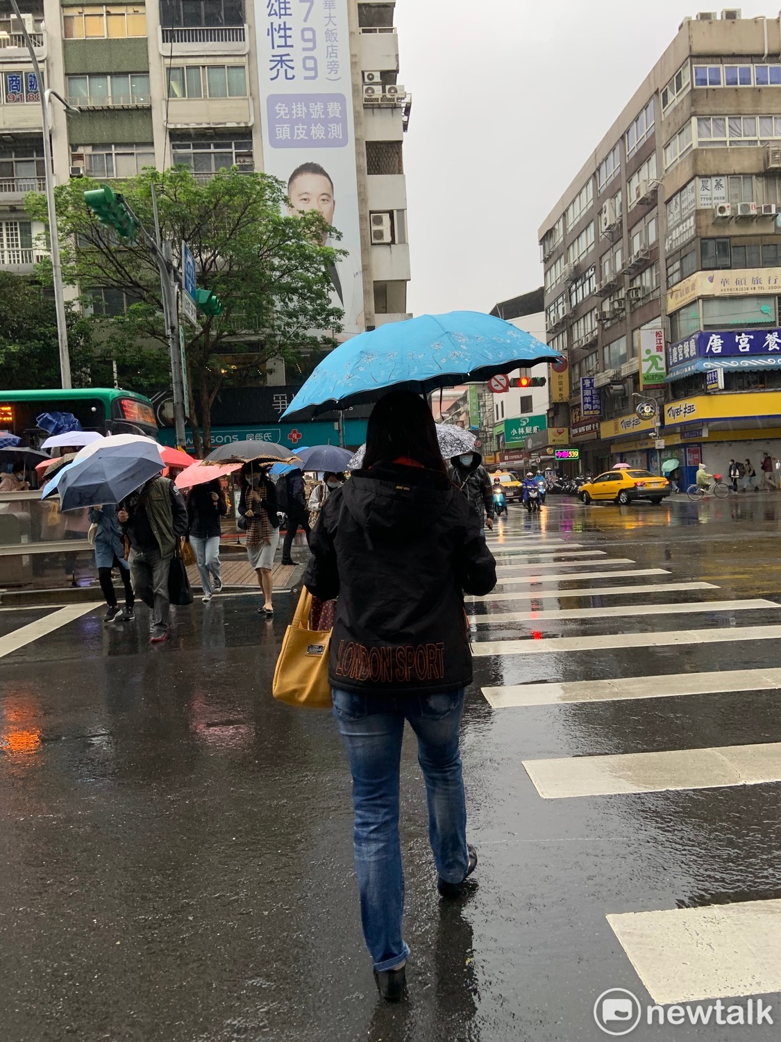 氣象局表示，下週一、二東北季風減弱才有望回溫。 圖：張家寧／攝