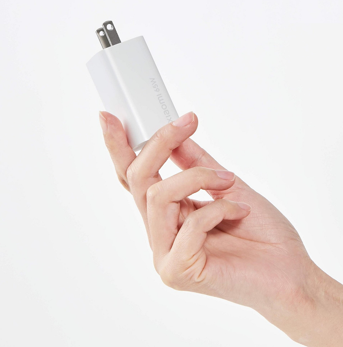 小米宣布取消手機隨盒附送充電器，以響應科技環保。圖為小米充電器示意圖。 圖：取自小米臉書