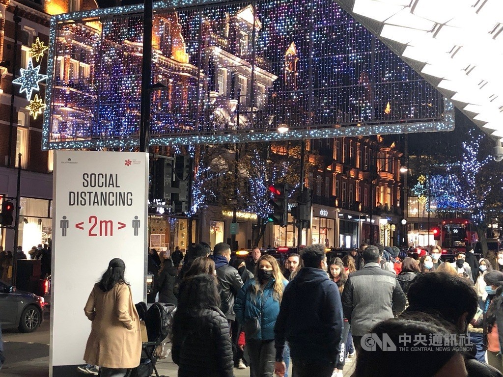 英國變種病毒疫情延燒，今天確診人數首次突破6萬人。（圖為2020年12月倫敦街頭） 圖 /中央社