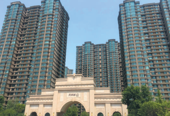 中國官媒新京報近日報導，河北省有人因無力繼續償還貸款，在網路上公告「送房」。 圖：翻攝新京報