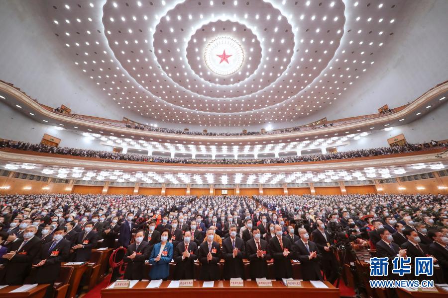 中國人大鼓掌通過香港 「愛國者治港」法案。 圖 : 翻攝自新華網