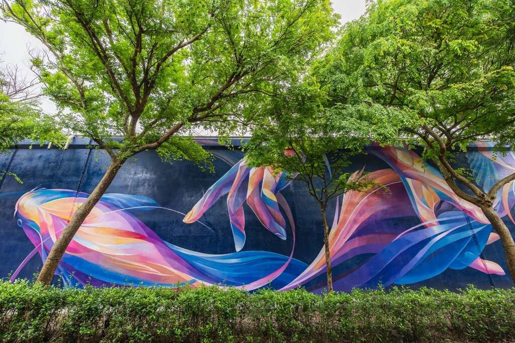 基隆河五號水門夢幻堤壁完工。 圖：台北水利處／提供