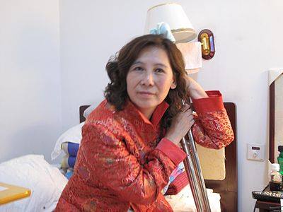 中國維權律師倪玉蘭(圖)，今年獲得美國國務院頒發的2016年「國際婦女勇氣獎」，卻遭中共以拒發護照等方式限制出境。 圖：翻攝自維基百科