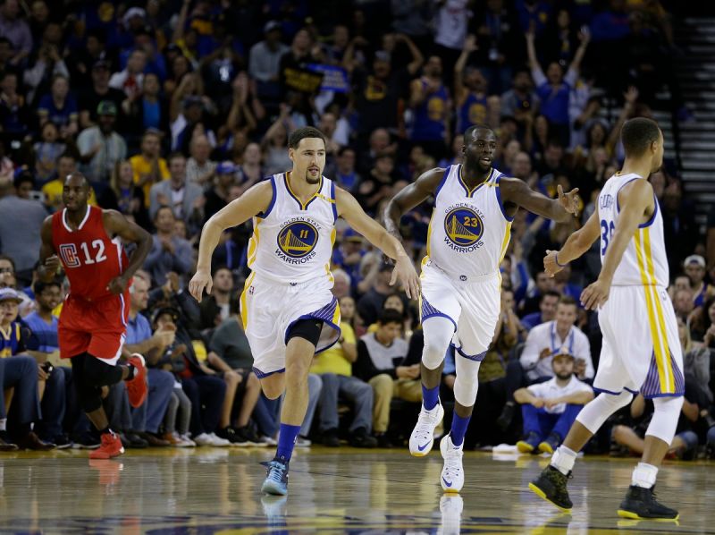 Klay Thompson(左起)、Draymond Green和Stephen Curry。 圖／美聯社／達志影像