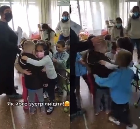 一名烏克蘭男童逃來西班牙後，進入一間幼兒園，這間幼兒園的學童紛紛上前給予這名男童擁抱安慰。 圖:Olexander Scherba推特