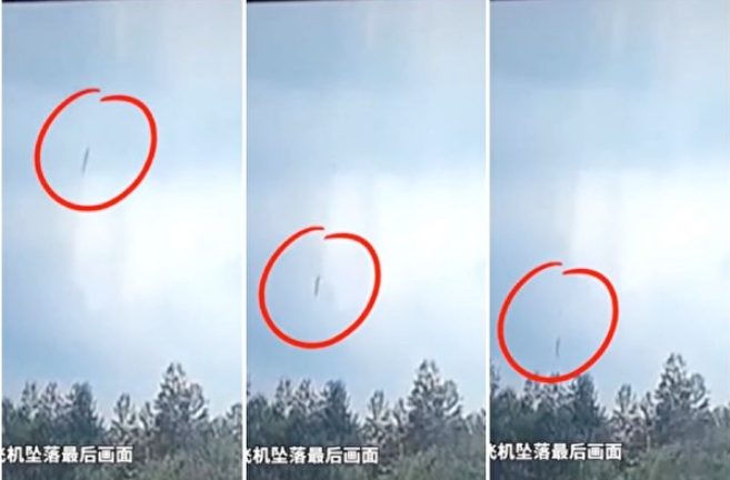 失事的中國東方航空被拍到以垂直角度墜向地面。 圖 : 翻攝自監視器畫面