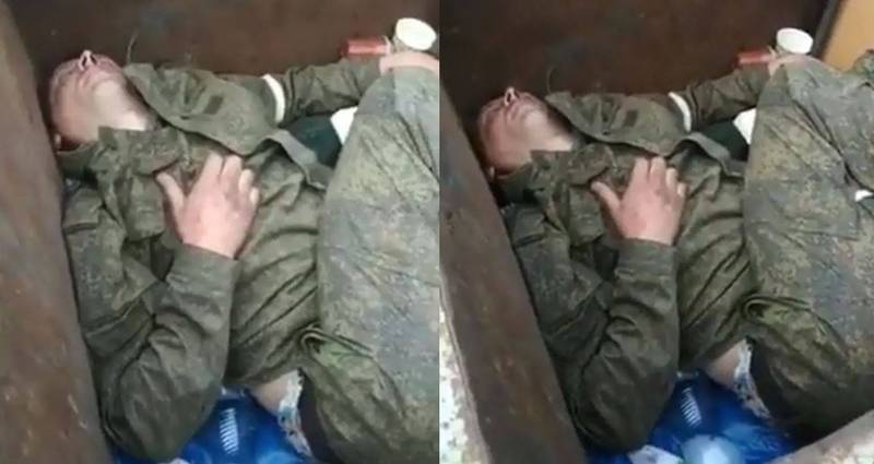 一名喝到爛醉的俄羅斯士兵躲在垃圾桶裡呼呼大睡，引來烏克蘭人圍觀訕笑。 圖：翻攝推特